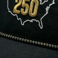 Close-up of USA 250 embroidery and the black-and-gold flecked rope.