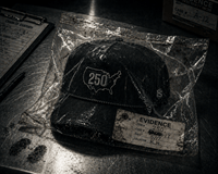 Black-and-white editorial view of USA 250 inside a clear evidence bag.